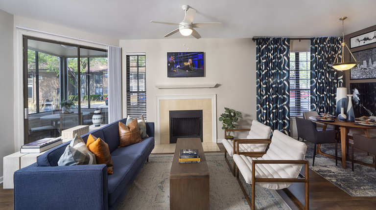 Spacious Living Room with Marble-Hearth Fireplace